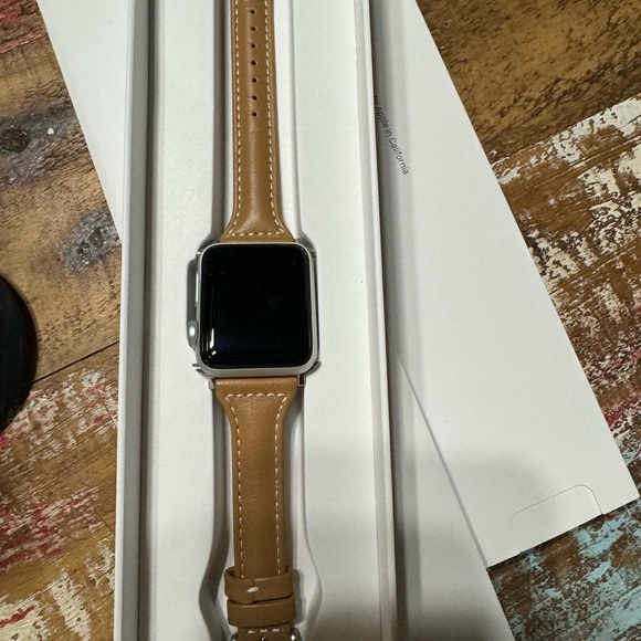 Apple smart watch . Series 3. Worn once & lost charge . Not able to get it on . - Picture 2 of 4